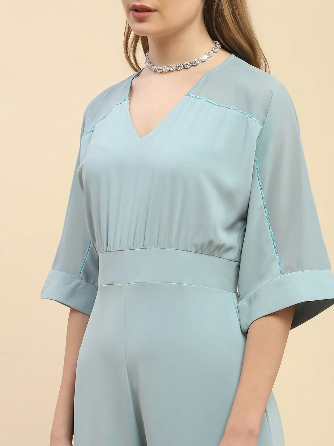 Camla Barcelona Trumpet Sleeve Powder Blue V-Neck Jumpsuit